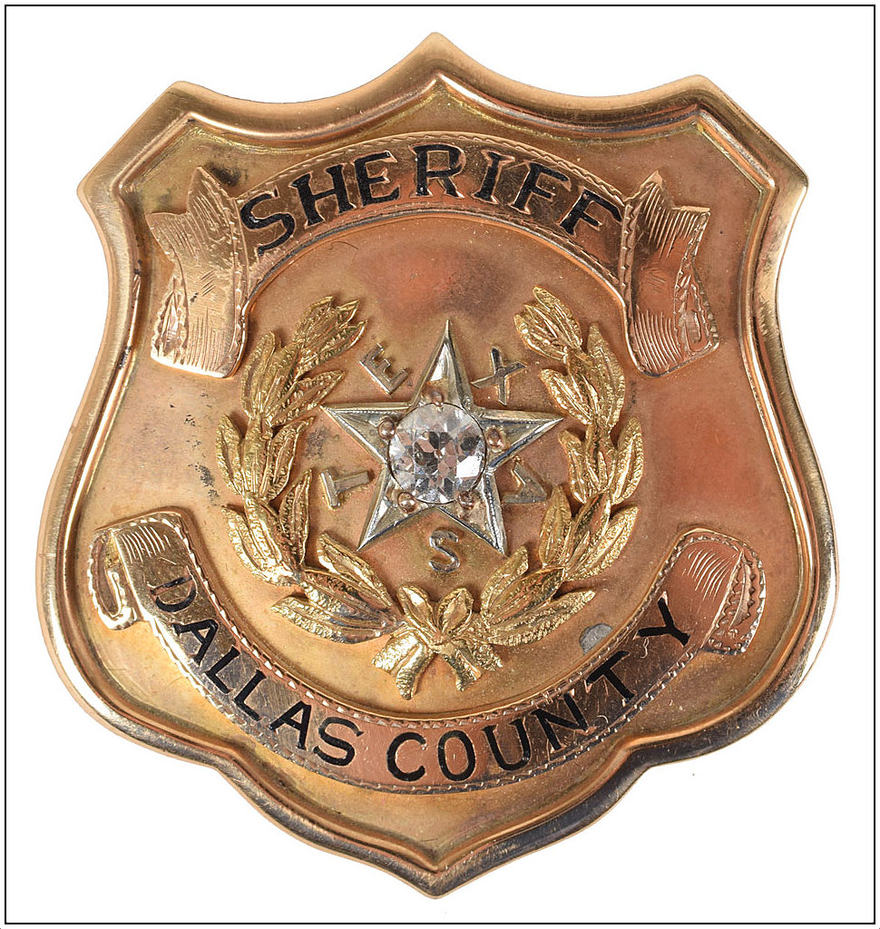 smoot-schmid_badge_front_rr-auction_june-2017